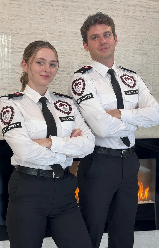 Supreme Security concierge team members in uniform at a residential property